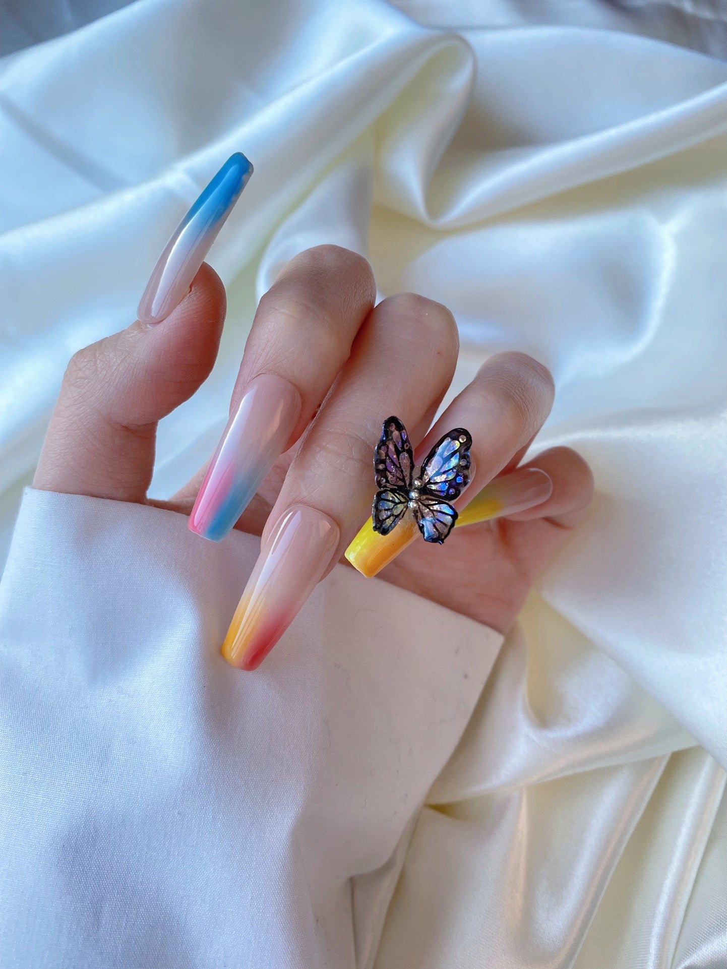 Gradient painted butterfly nail art