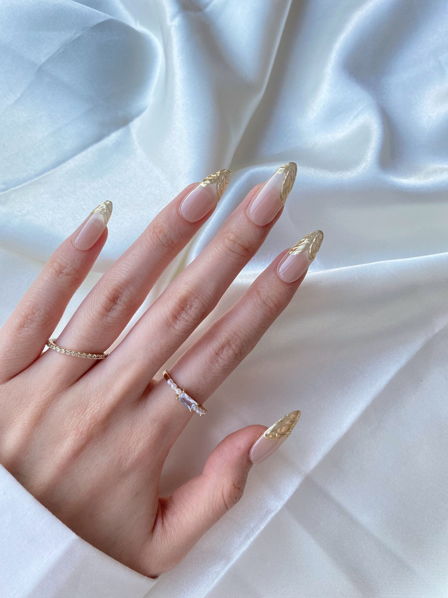 Gold embossed French manicure