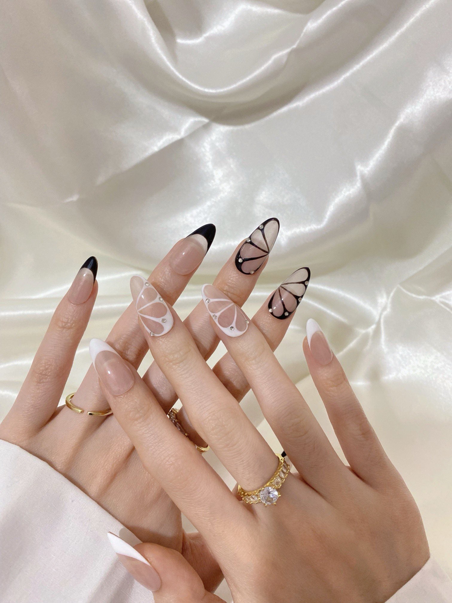 Black and white painted AB face fashion nail art