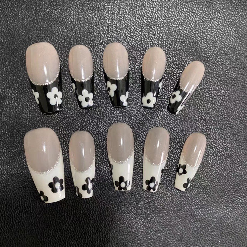 Black and white five-petal French manicure