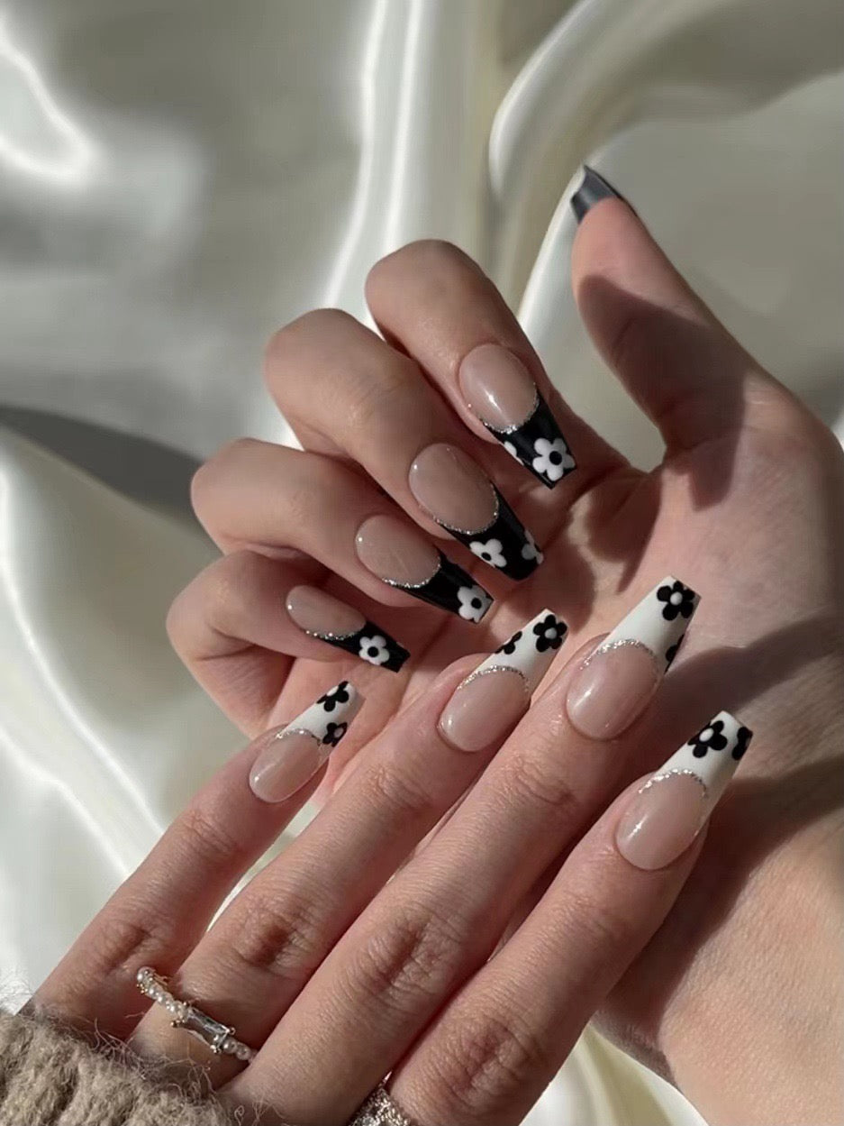 Black and white five-petal French manicure