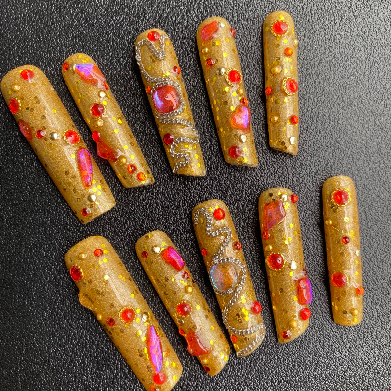 Gold ornate embossed nail art