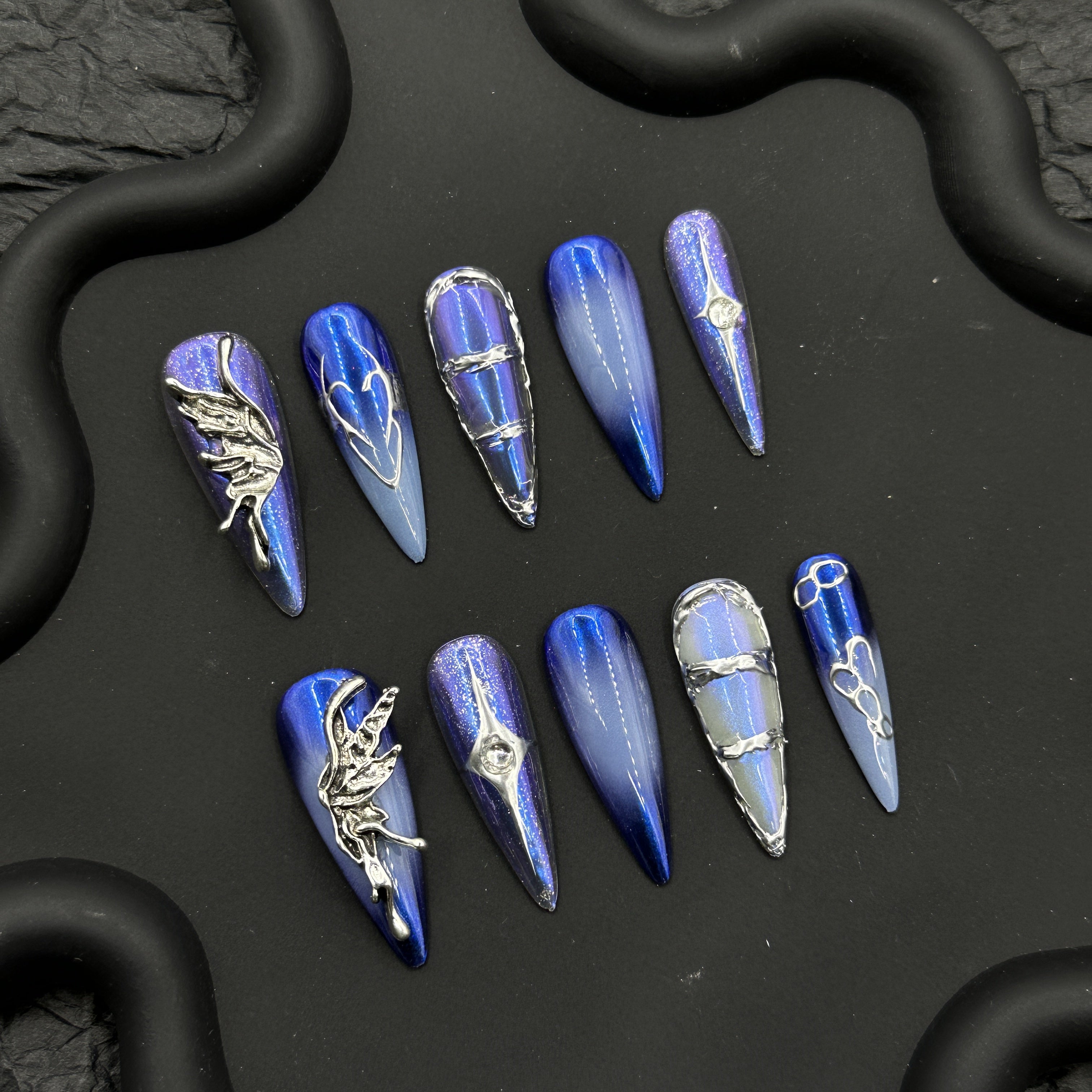 Royal blue hand-painted long manicure