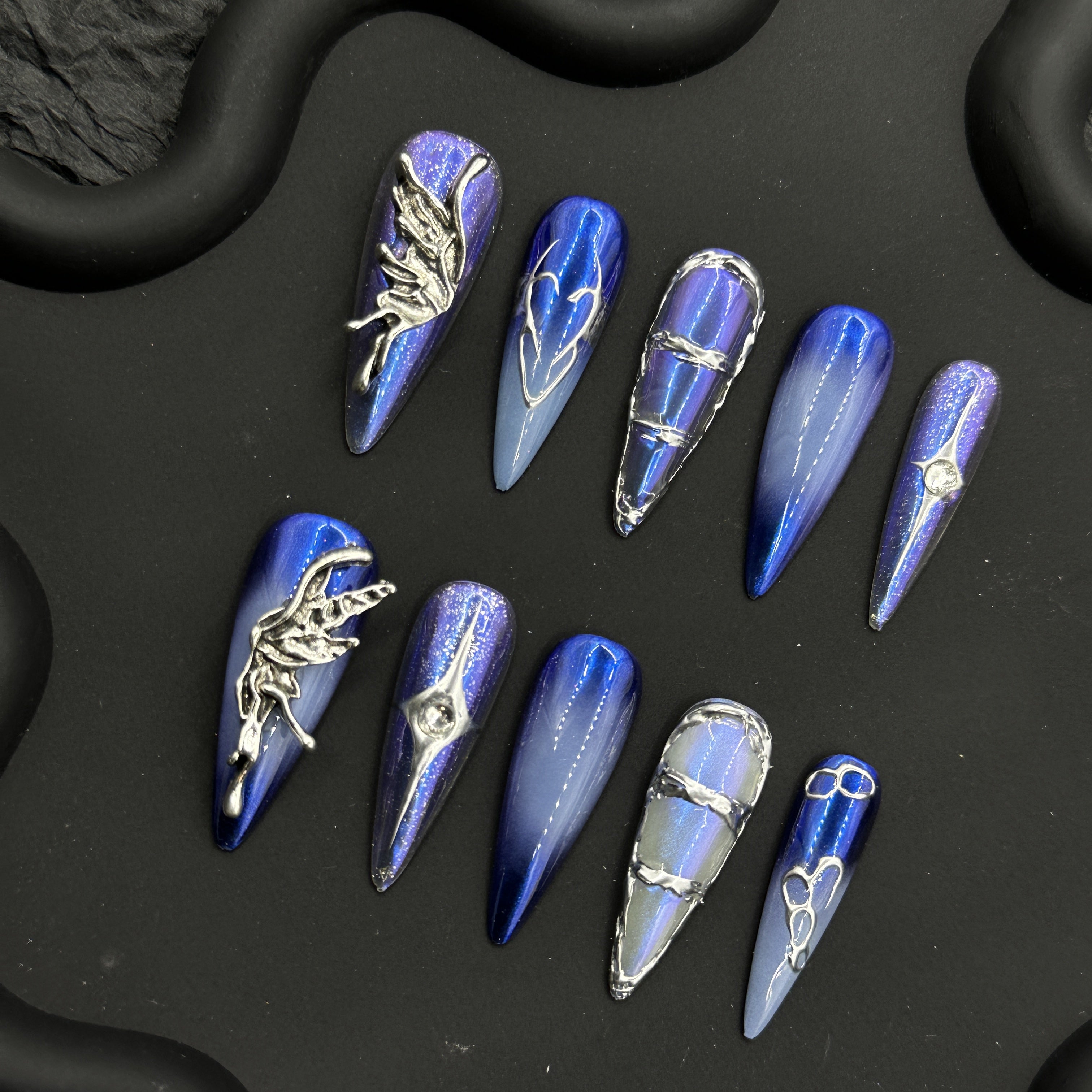 Royal blue hand-painted long manicure