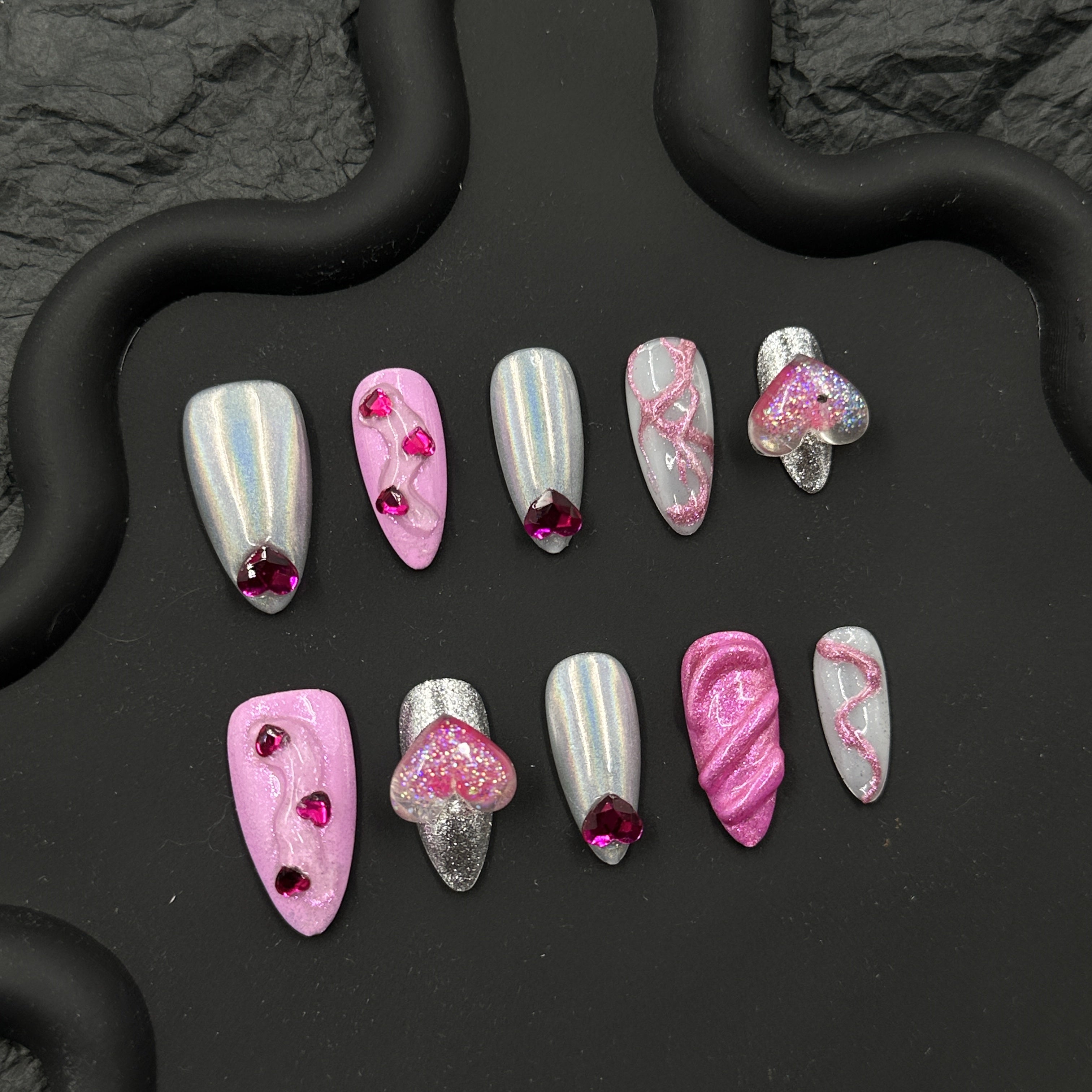 Pink heart embossed nail art