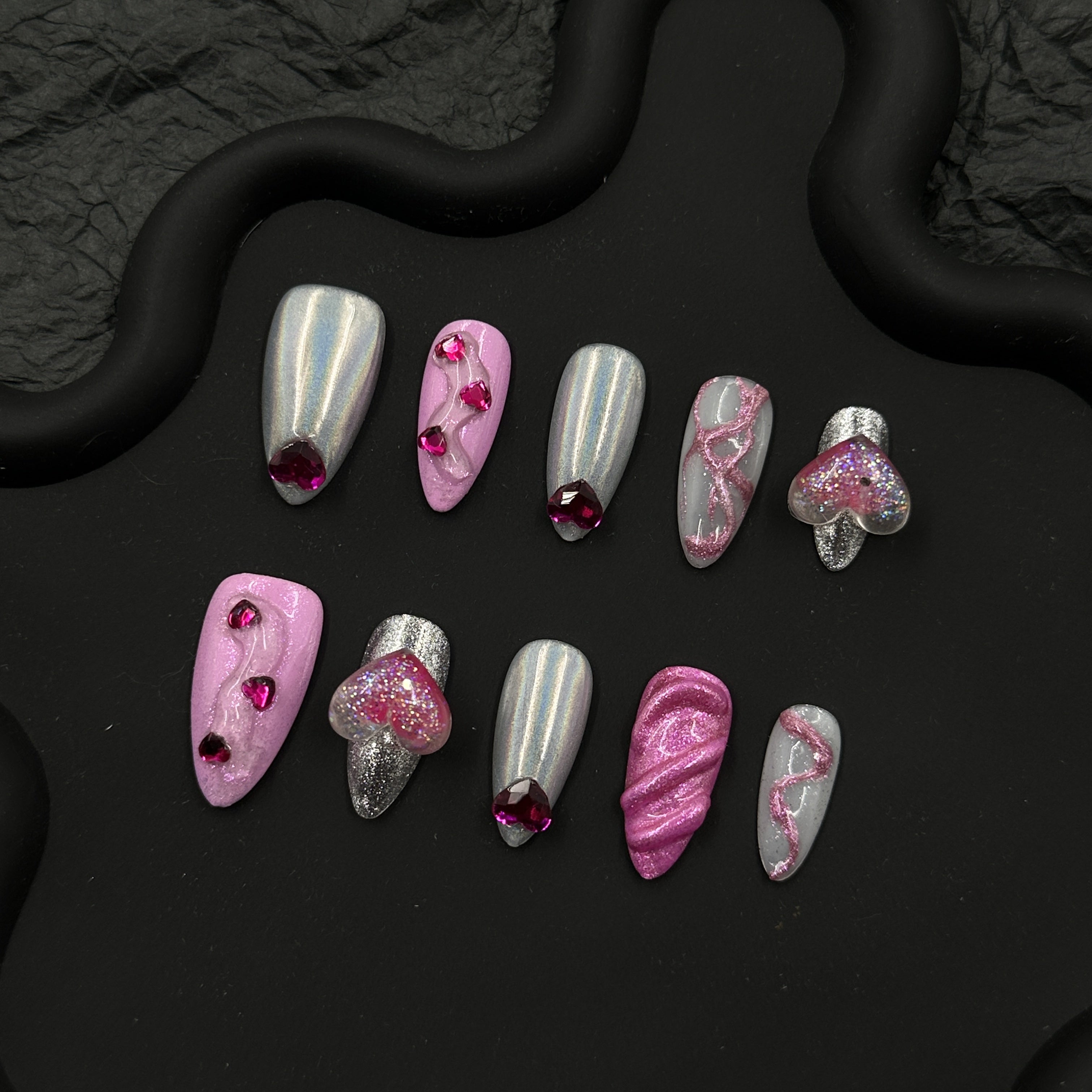 Pink heart embossed nail art