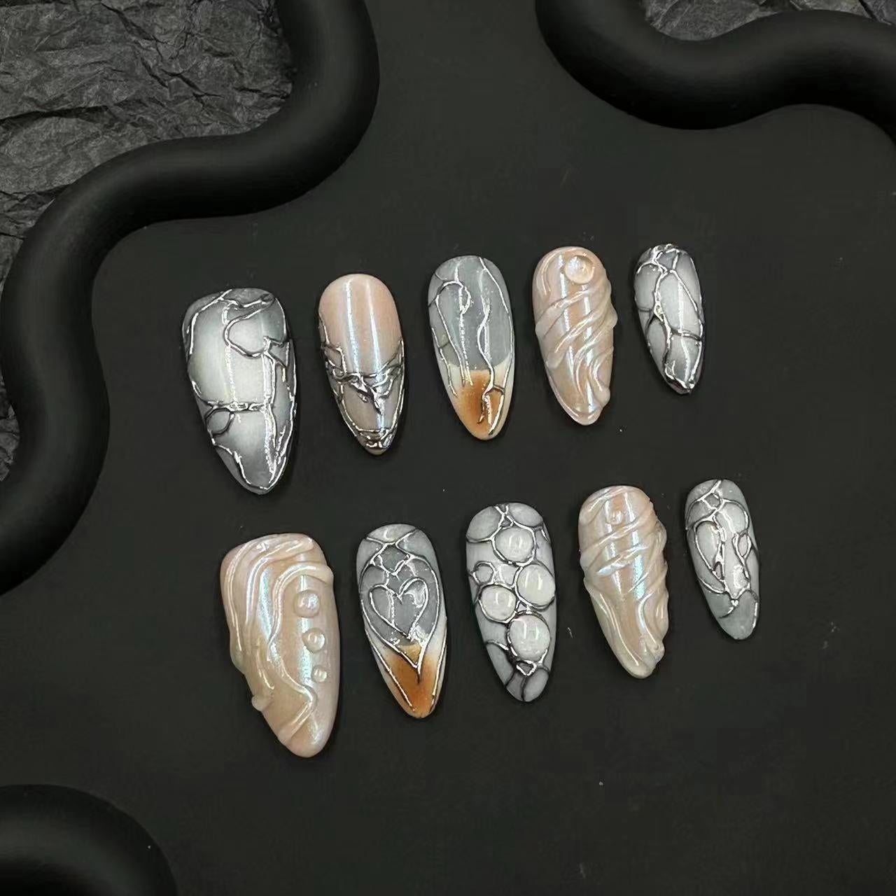 Hand-painted embossed nail art